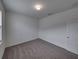 Bright bedroom with neutral walls and carpeted floors at 232 Samantha Ave, Auburndale, FL 33823