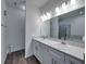 Bathroom with double vanity, and gray tile flooring at 232 Samantha Ave, Auburndale, FL 33823