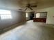 Open living and kitchen area with tiled floor at 829 Wasena Ave, Lakeland, FL 33815