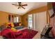 Living room with a brown sectional sofa and a burgundy rug at 4067 Sw 46Th Ter, Ocala, FL 34474