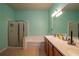 Bathroom boasts a large soaking tub and double vanity at 4067 Sw 46Th Ter, Ocala, FL 34474