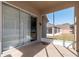 Covered patio with sliding glass doors and backyard access at 4067 Sw 46Th Ter, Ocala, FL 34474