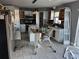 Kitchen with island and white cabinets at 5018 Strada Dr, Winter Haven, FL 33880