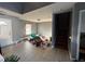 Living area with tile flooring and staircase at 5018 Strada Dr, Winter Haven, FL 33880