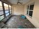 Enclosed patio with tiled flooring and a ceiling fan at 5018 Strada Dr, Winter Haven, FL 33880