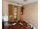 Bedroom with wall bed and wood laminate flooring at 5018 Strada Dr, Winter Haven, FL 33880