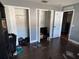 Bedroom with double door closets and wood flooring at 5018 Strada Dr, Winter Haven, FL 33880