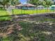 Large backyard with a pool and shed at 2002 Amesbury Dr, Auburndale, FL 33823