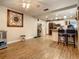 Gathering room with view into kitchen and breakfast bar at 2002 Amesbury Dr, Auburndale, FL 33823