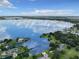 Expansive lakefront view with surrounding landscape at 2002 Amesbury Dr, Auburndale, FL 33823