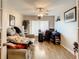 Home office with a desk, comfortable couch, and ceiling fan at 2002 Amesbury Dr, Auburndale, FL 33823
