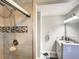 Shower with tile surround and a modern design at 2002 Amesbury Dr, Auburndale, FL 33823