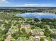 Aerial view of lakefront homes and community at 2002 Amesbury Dr, Auburndale, FL 33823
