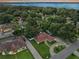 Aerial view of house and neighborhood at dusk at 2002 Amesbury Dr, Auburndale, FL 33823