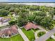 Aerial view of lakefront community, highlighting the neighborhood's location and waterfront access at 2002 Amesbury Dr, Auburndale, FL 33823