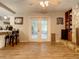 Bright dining area with wood-look floors and access to the backyard at 2002 Amesbury Dr, Auburndale, FL 33823