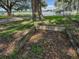 Decayed wooden structure near lakefront property at 2002 Amesbury Dr, Auburndale, FL 33823