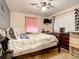 Spacious bedroom with ceiling fan, and plenty of natural light at 2002 Amesbury Dr, Auburndale, FL 33823