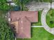 Top-down view of house roof and driveway at 2002 Amesbury Dr, Auburndale, FL 33823