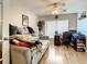 Home office with a desk, comfortable couch, and ceiling fan at 2002 Amesbury Dr, Auburndale, FL 33823
