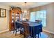 Dining room with wood table and hutch at 2002 Amesbury Dr, Auburndale, FL 33823