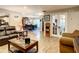 Open living room and dining area with hardwood flooring at 2002 Amesbury Dr, Auburndale, FL 33823