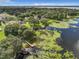 Aerial view showcasing lakefront home and community at 2002 Amesbury Dr, Auburndale, FL 33823