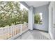 Private balcony overlooking tree-lined street at 3366 Cat Brier Trl, Harmony, FL 34773