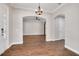 Bright and airy entryway with hardwood floors and views to other rooms at 3366 Cat Brier Trl, Harmony, FL 34773