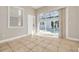 Room with sliding glass doors overlooking the pool at 3366 Cat Brier Trl, Harmony, FL 34773