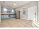 Pool cabana with kitchenette and tile flooring at 3366 Cat Brier Trl, Harmony, FL 34773