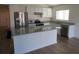 Modern kitchen with stainless steel appliances and granite countertops at 148 Summerlin Loop, Haines City, FL 33844