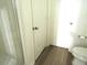 Bathroom with shower stall, toilet and door to another room at 148 Summerlin Loop, Haines City, FL 33844
