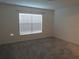 Simple bedroom with carpeted floor and window coverings at 148 Summerlin Loop, Haines City, FL 33844