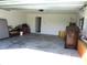 Garage with access door to the house and some storage at 148 Summerlin Loop, Haines City, FL 33844