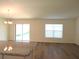 Bright living room with sliding glass doors leading to the backyard at 148 Summerlin Loop, Haines City, FL 33844