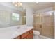 Clean bathroom with a large shower and updated vanity at 2572 Berrington Loop, The Villages, FL 32162