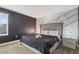 Spacious bedroom with king-size bed and accent wall at 4550 Narrative Ln, Kissimmee, FL 34746