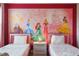 Two twin beds and a princess mural at 4550 Narrative Ln, Kissimmee, FL 34746