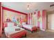 Two twin beds in a room with a princess theme at 4550 Narrative Ln, Kissimmee, FL 34746