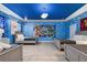 Toy Story themed bedroom with four twin beds and blue walls at 4550 Narrative Ln, Kissimmee, FL 34746