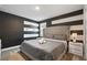 King bedroom with gray walls and striped accent at 4550 Narrative Ln, Kissimmee, FL 34746
