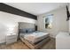 Guest bedroom with a king-size bed and stylish decor at 4550 Narrative Ln, Kissimmee, FL 34746
