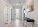 Bright entryway with tile floors and console table at 4550 Narrative Ln, Kissimmee, FL 34746