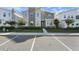 Two-story modern home with stone accents and landscaping at 4550 Narrative Ln, Kissimmee, FL 34746