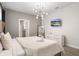Comfortable main bedroom with ensuite bathroom access at 4550 Narrative Ln, Kissimmee, FL 34746