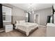 Spacious Primary bedroom with plush bed and modern dresser at 4550 Narrative Ln, Kissimmee, FL 34746