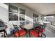 Outdoor patio with table, chairs, and grill at 4550 Narrative Ln, Kissimmee, FL 34746