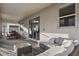 Covered patio with seating area and view of pool at 4550 Narrative Ln, Kissimmee, FL 34746