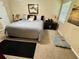 Spacious bedroom with king-size bed, ample floor space and a night stand at 3234 Bonnybrook S Dr, Lakeland, FL 33811